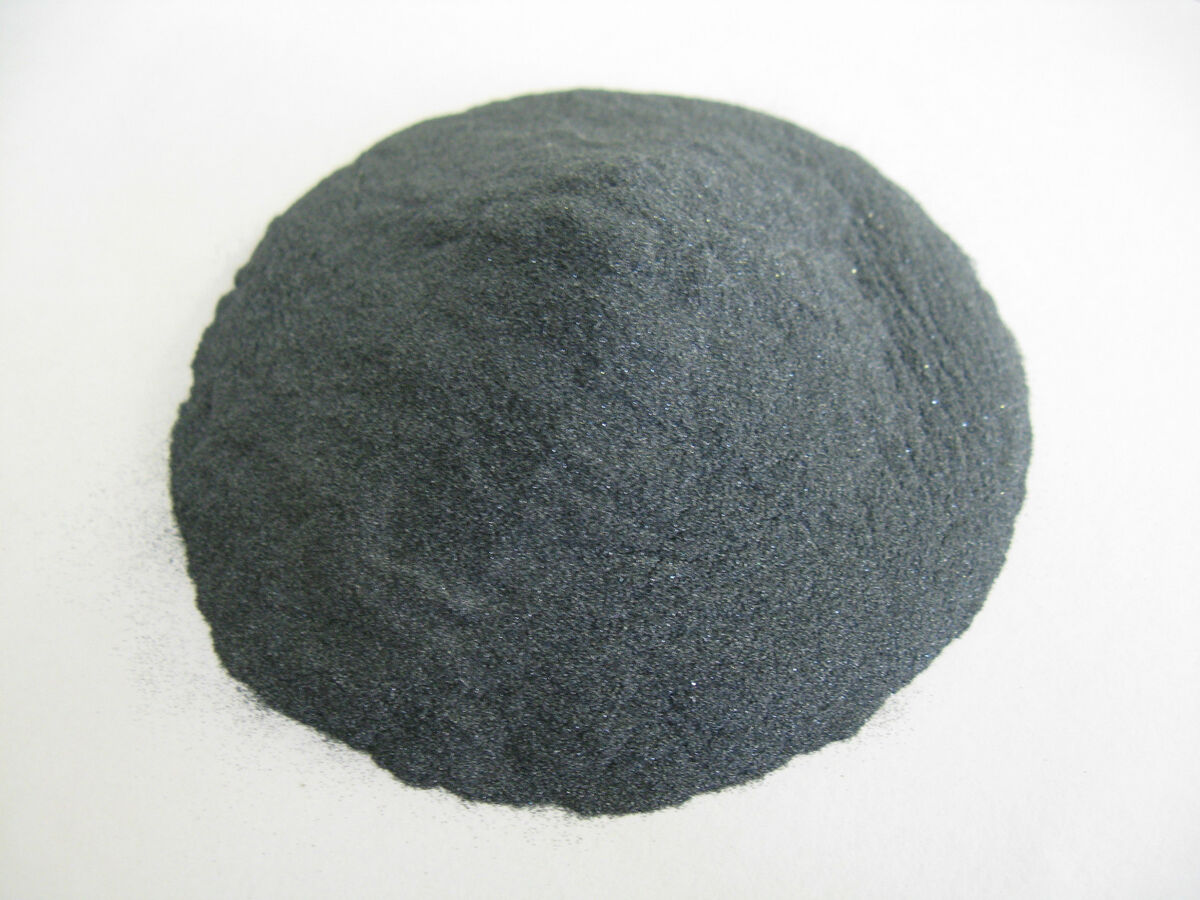 A relevant stock photo of 220 grit silicon carbide powder in a typical setting.