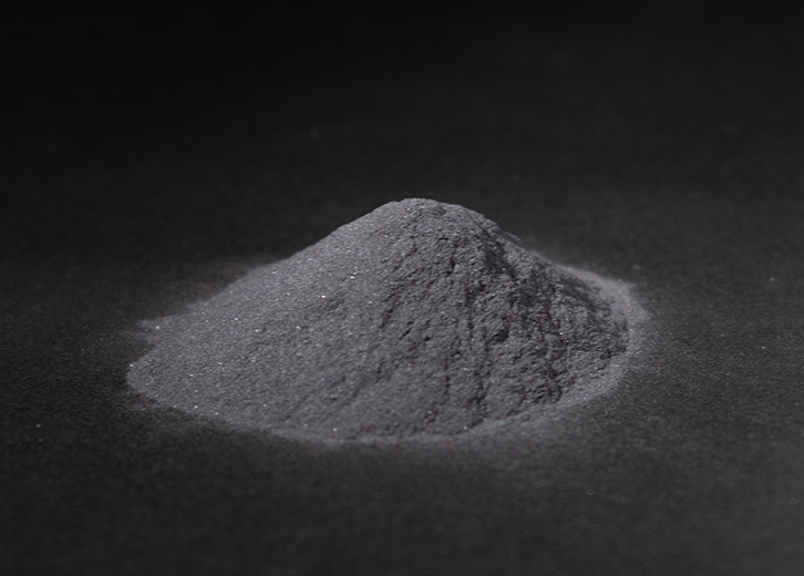 A relevant stock photo of black fused alumina powder in a typical setting.