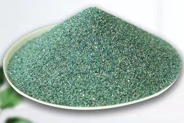 A relevant stock photo of green silicon carbide manufacturing in a typical setting.
