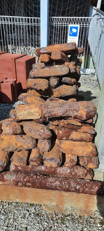 A relevant stock photo of iron ballast in a typical setting.
