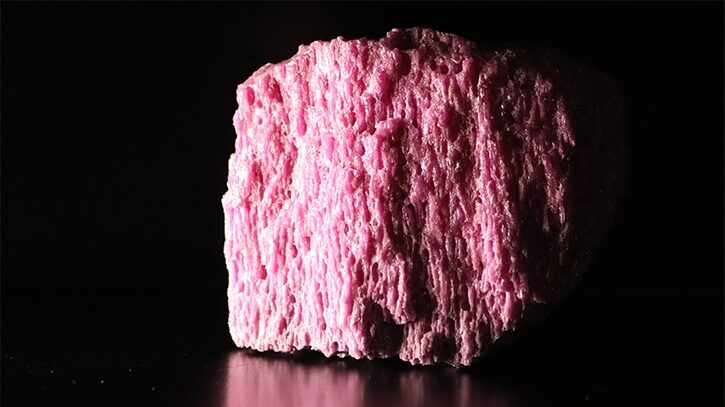 A relevant stock photo of pink fused alumina abrasives in a typical setting.