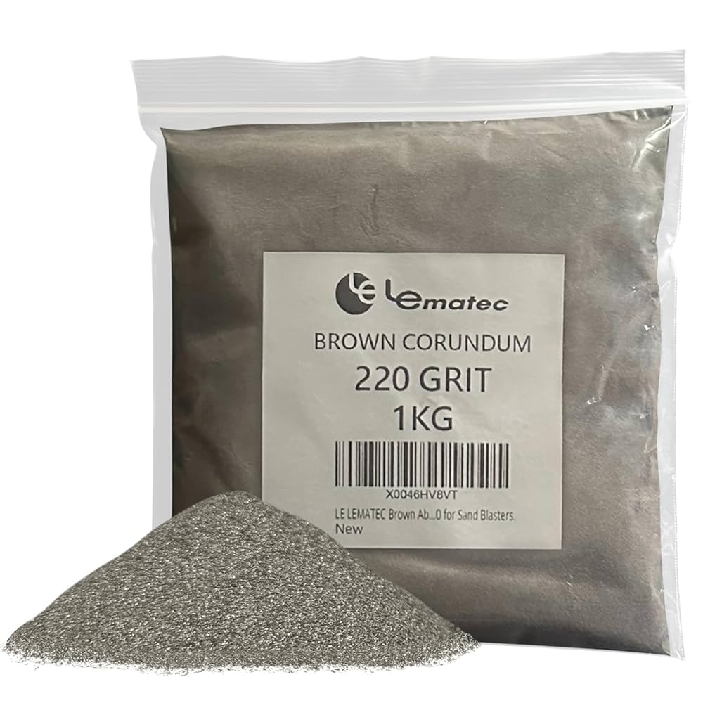 A relevant stock photo of sand blasting corundum abrasives in a typical setting.