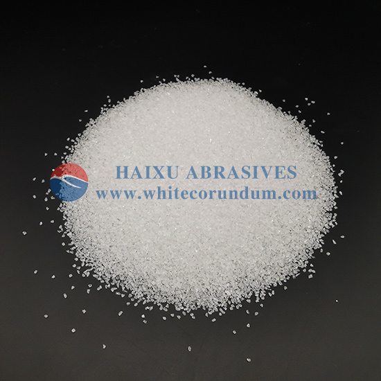 A relevant stock photo of white corundum abrasives in a typical setting.